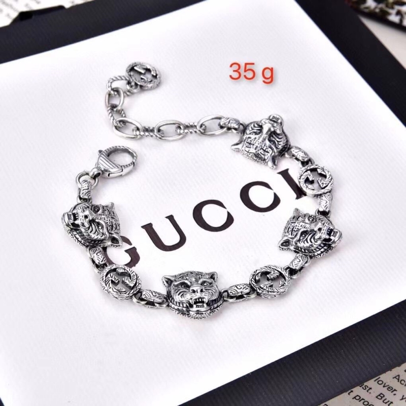 G*u*i bracelets